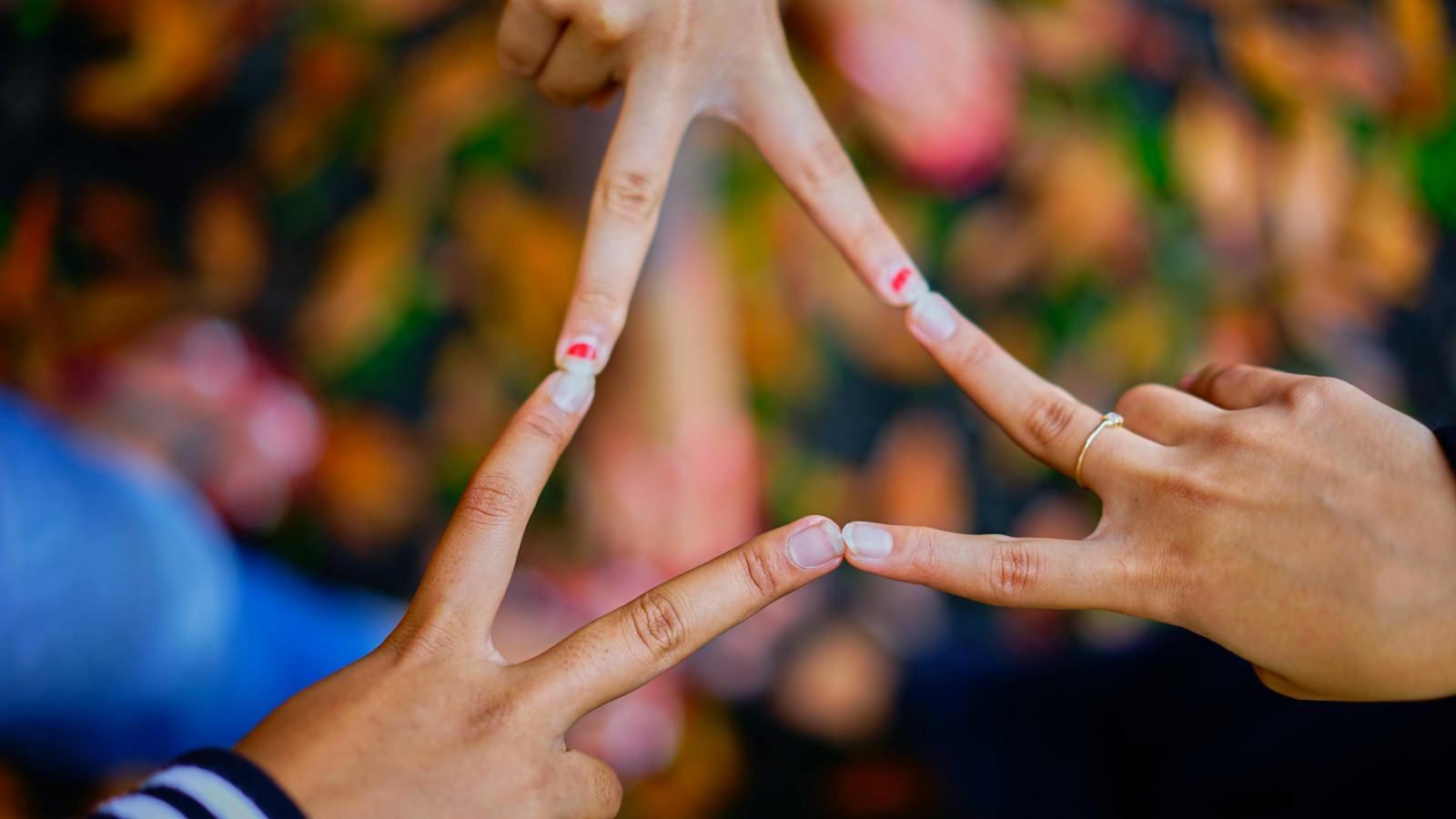 Hands joining together